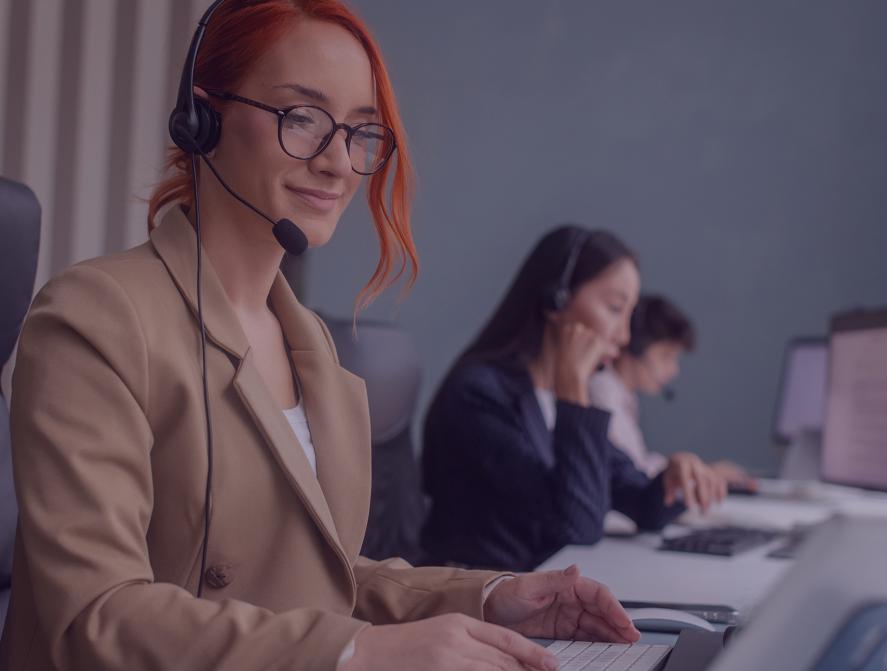 Customer support professionals at their work stations.